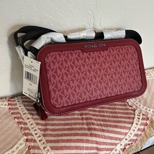 NWT $258 Michael Kors Cooper Signature Logo Crossbody Bag in the color Cherry.